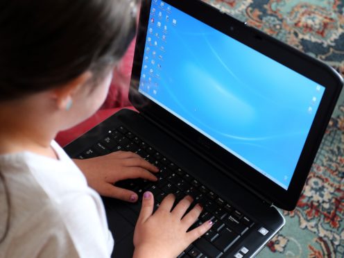 Technology firms have been urged to use age verification tools to stop children from viewing gambling ads online (Peter Byrne/PA)