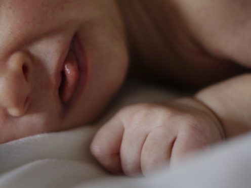 Hiccuping can also be observed in the womb, sometimes as early as nine weeks into the pregnancy (Danny Lawson/PA)