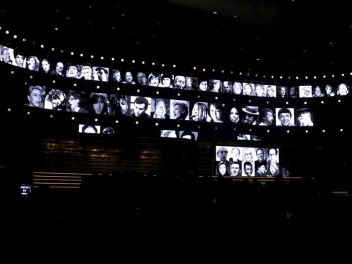Members of the music community are remembered during an in memoriam tribute at the 62nd annual Grammy Awards (Matt Sayles/Invision/AP)