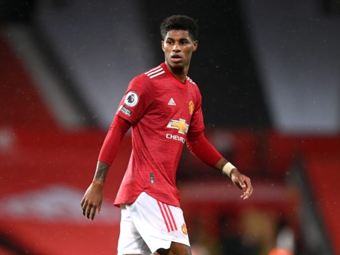 Marcus Rashford has drawn praise for highlighting the issue of child food poverty, but his club Manchester United have been urged to pay staff the living wage (Michael Regan/PA)