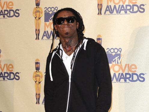 Rapper Lil Wayne has thanked Donald Trump for pardoning him during his final days as president (Ian West/PA)