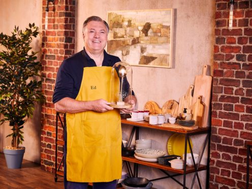 Ed Balls, winner of Celebrity Best Home Cook, holds the Golden Spoon trophy ( BBC/KEO Films/PA)