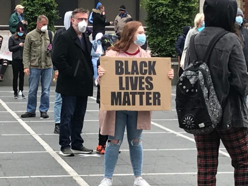 People take part in a Black Lives Matter protest rally in Custom House Square, Belfast, in memory of George Floyd who was killed on May 25 while in police custody in the US city of Minneapolis.