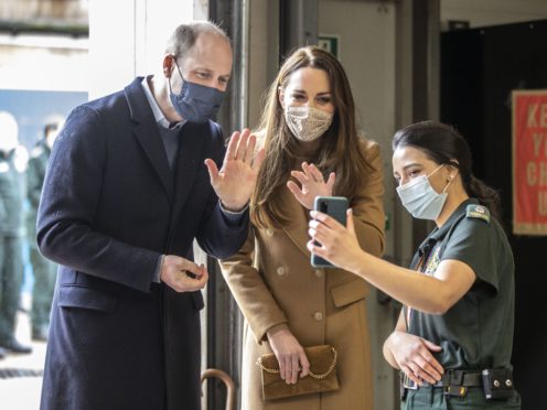 The Duke and Duchess of Cambridge chat to Jay Khan’s family (Richard Pohle/The Times/PA)