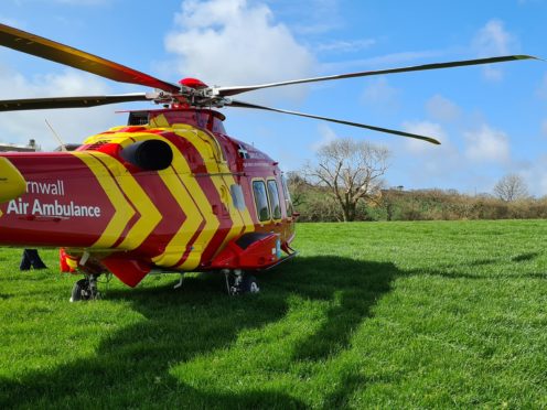 A Cornwall Air Ambulance at the scene of the crash (Cornwall Air Ambulance/PA)