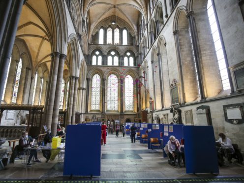 Cubicles inside Salisbury Cathedral, Wiltshire, for people to receive their coronavirus vaccinations (Steve Parsons/PA)