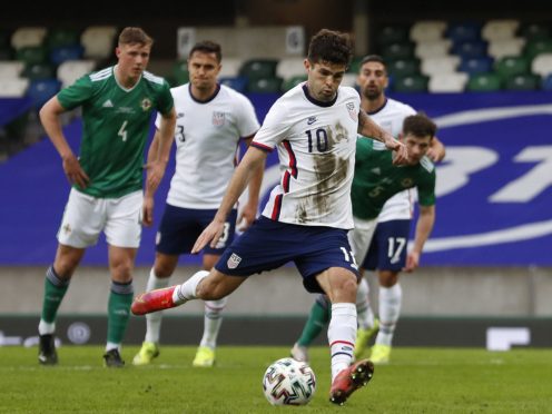 Christian Pulisic scores from the penalty spot against Northern Ireland (Liam McBurney/PA)