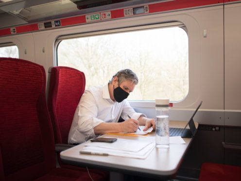Labour Party leader Sir Keir Starmer takes the train to Hartlepool where he will campaign with the party’s by-election candidate, Dr Paul Williams, during a visit to the area (Stefan Rousseau/PA)
