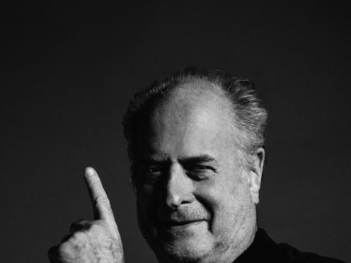 Bruce Springsteen, Kylie Minogue and Ed Sheeran are among the stars who have paid tribute to the influential Australian music promoter Michael Gudinski (Mushroom Group/PA)