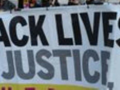 A Black Lives Matter banner (PA)
