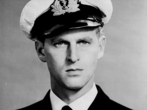 The Duke of Edinburgh as a serving officer in the Royal Navy (PA)