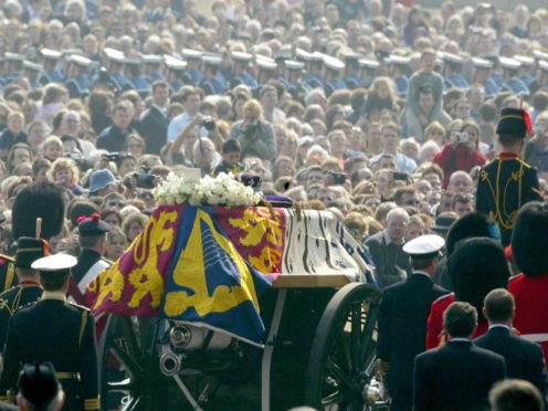 The gun carriage carrying the coffin of the Queen Mother (PA)