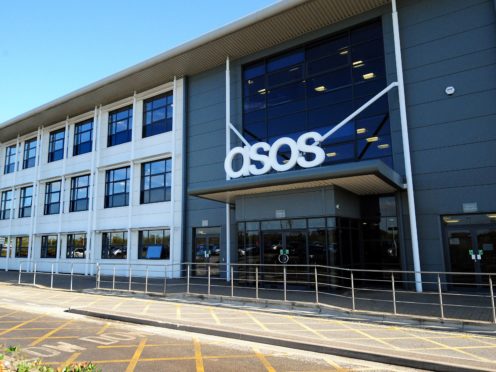 Asos saw sales rise thanks to the latest Covid-19 restrictions forcing high street stores to close (Rui Vieira/PA)