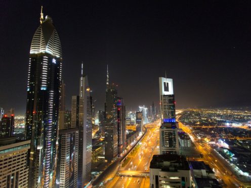 A view of the skyline at night of Dubai (Yui Mok/PA)