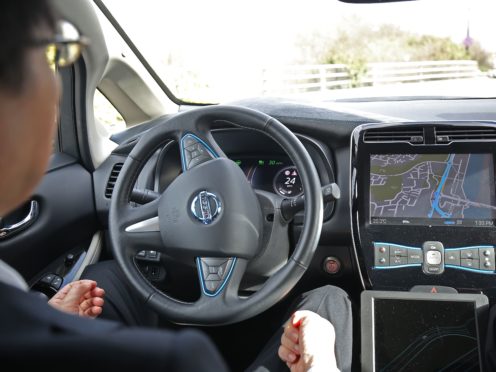 Self-driving cars enabling drivers to take their eyes off the road and their hands off the wheel could be permitted on UK motorways later this year (Philip Toscano/PA)