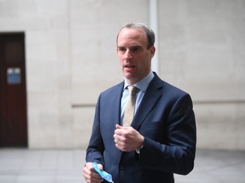 Dominic Raab was accused of ‘sneaking out draconian cuts’ to the foreign aid budget (Victoria Jones/PA)