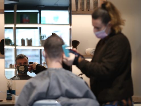 Hairdressers said they have been inundated with people wanting appointments (Yui Mok/PA)