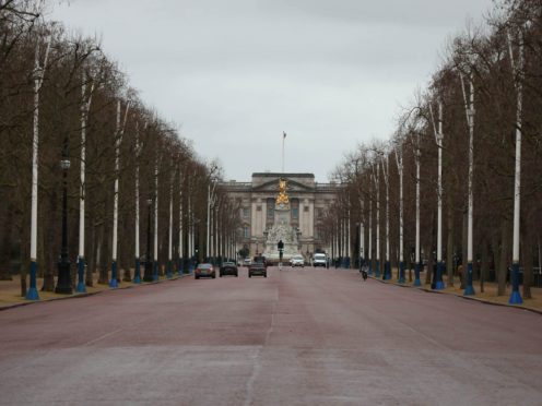 A man who was arrested after allegedly carrying an axe near Buckingham Palace is to appear in court (Luciana Guerra/PA)