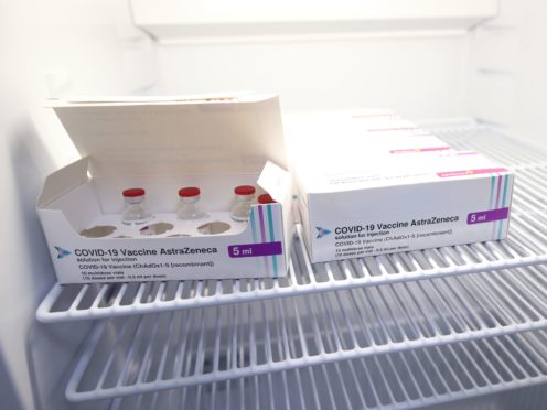 Vials of the Oxford/AstraZeneca coronavirus vaccine are stored in a temperature-controlled fridge in Streatham, south London (Yui Mok/PA)