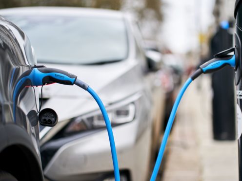 Cars on roads will increasingly be electric as part of efforts to cut carbon (John Walton/PA)