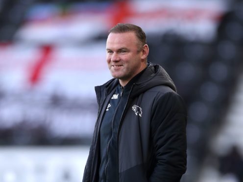 Derby manager Wayne Rooney saw his side ease their relegation worries against Luton (Bradley Collyer/PA)