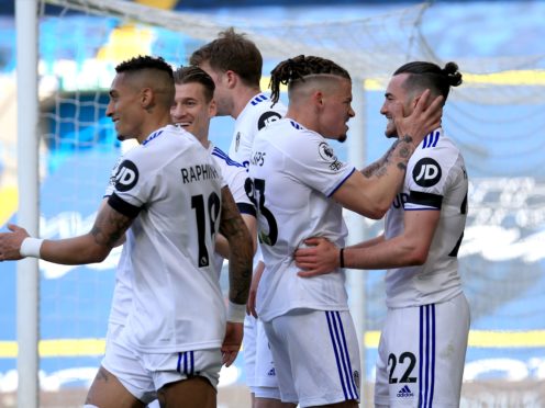 Jack Harrison, right, is congratulated by his Leeds team-mates after scoring in last week’s home win against Sheffield United (Lindsey Parnaby/PA)