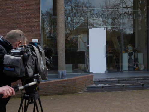 The glass door which was smashed during a break-in at the Singer Museum in Laren, Netherlands (Peter Dejong/AP)