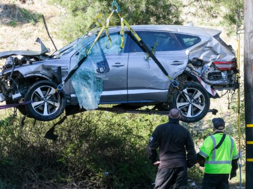 Tiger Woods was driving well over the speed limit when he crashed (Ringo H.W. Chiu/AP)