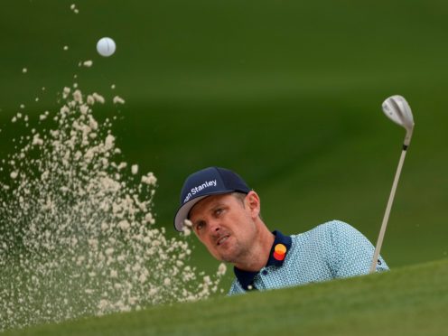 Justin Rose added a 72 to his opening 65 in the Masters (Gregory Bull/AP)