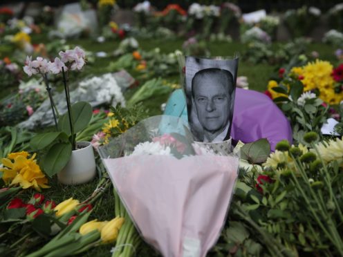 Floral tributes have been left outside Windsor Castle following the death of the Duke of Edinburgh (Steve Parsons/PA)