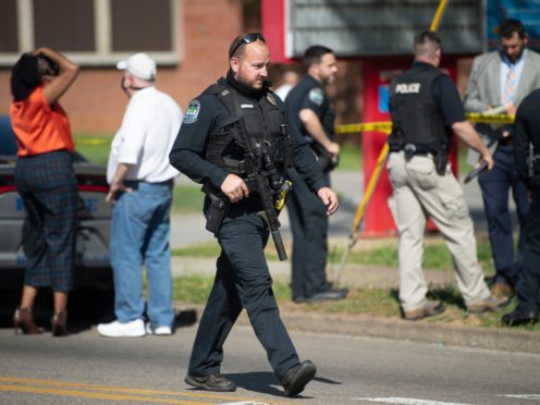 A pupil who opened fire on officers responding to a report of a possible gunman at a Tennessee high school has been fatally shot by police (Saul Young/The News Sentinel/AP)