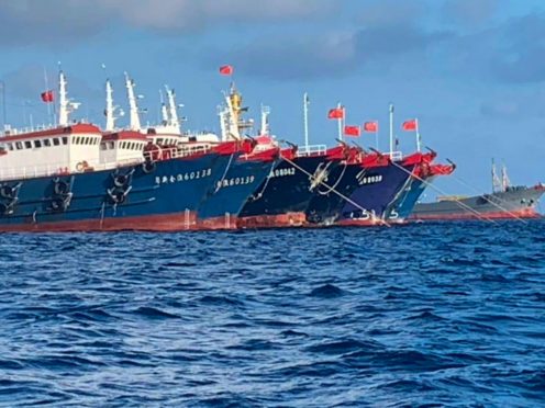 Chinese vessels moored at Whitsun Reef in the South China Sea (National Task Force-West Philippine Sea/AP)
