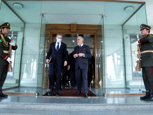 Abdullah Abdullah, Chairman of the High Council for National Reconciliation, walks with US Secretary of State Antony Blinken, at the Sapidar Palace in Kabul (Sapidar Palace via AP)