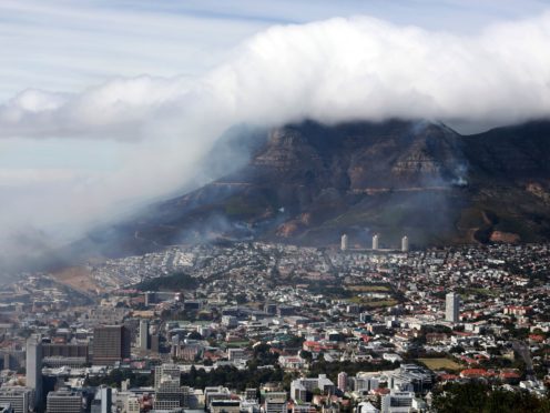 Clouds of smoke are seen above the city of Cape Town, South Africa (Nardus Engelbrecht/AP)