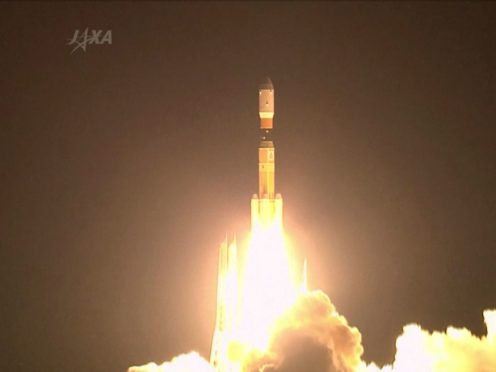 A rocket lifts off from a launch pad at the Tanegashima Space Centre in Tanegashima, southern Japan (JAXA via AP video)