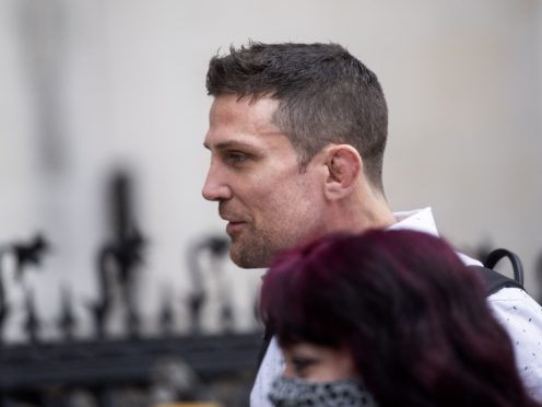 Former cage fighter Alex Reid arrives at the Royal Courts of Justice, London, where he has been jailed for eight weeks for contempt of court after he lied in a witness statement for a compensation claim following a car crash. Picture date: Wednesday April 21, 2021.