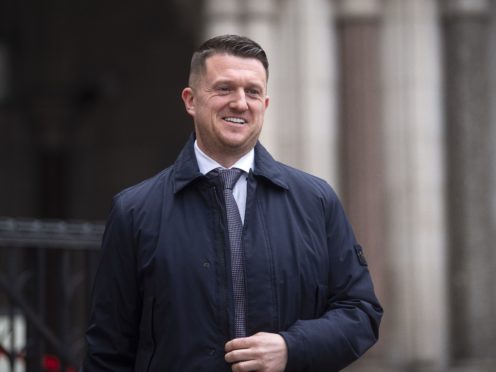Tommy Robinson leaving the Royal Courts of Justice (Victoria Jones/PA)