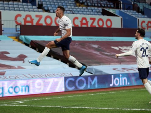 Manchester City’s Rodri celebrates his goal at Aston Villa (Carl Recine/PA)