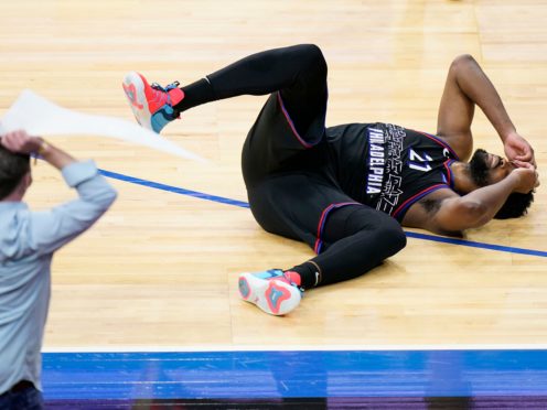 Philadelphia 76ers’ Joel Embiid reacts after missing a shot in the final second of the game against the Phoenix Suns (Matt Slocum/AP)