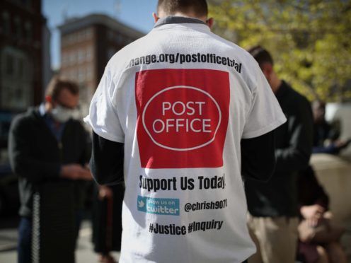 Protesters outside the Royal Courts of Justice in London, where dozens of former subpostmasters who were convicted of theft, fraud and false accounting, because of the Post Office’s defective Horizon accounting system, are expected to finally have their names cleared by the Court of Appeal. Issue date: Friday April 23, 2021.