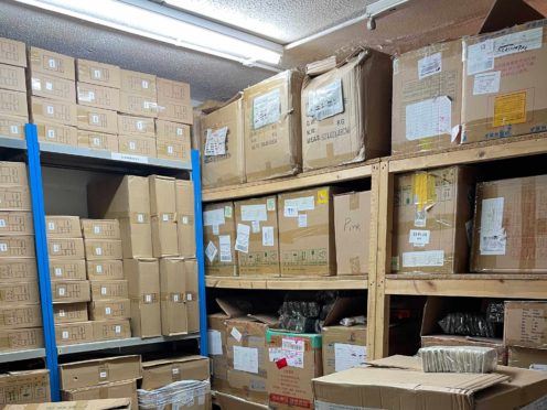 One of the hauls of fake designer goods found in Manchester (City of London Police/PA)