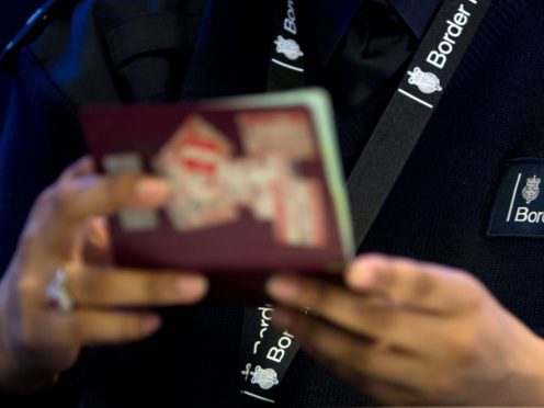 Border Force is ‘choosing’ not to fully staff airport arrival halls where passengers are being forced to wait in long queues, a trade body has claimed (Steve Parsons/PA)