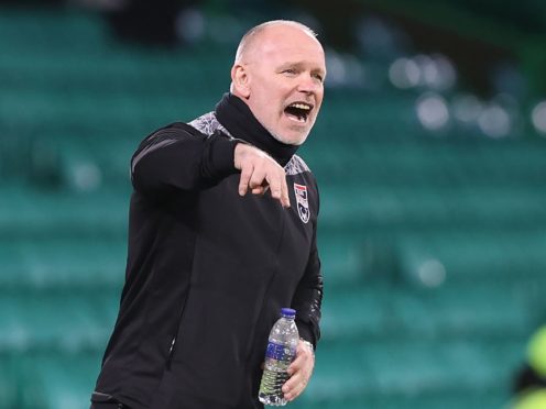 Ross County manager John Hughes insists sitting in the stand is no major problem (Jeff Holmes/PA)