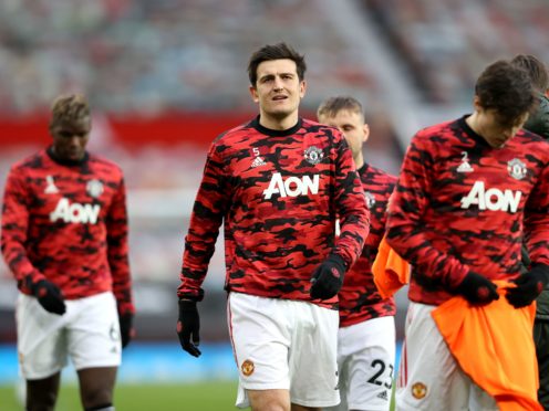 Harry Maguire and his Manchester United team-mates face a punishing schedule over the next week (Clive Brunskill/PA)