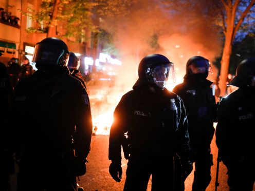 Police officers during a May Day rally in Berlin (Markus Schreiber/AP)