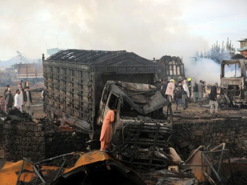 A damaged truck that caught fire in Kabul, Afghanistan (Rahmat Gul/AP)