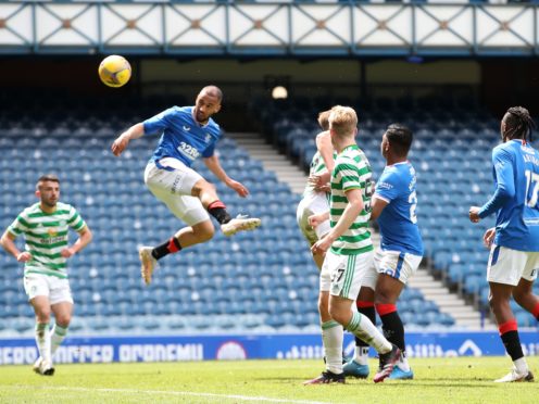 Kemar Roofe heads home his second goal in Rangers’ 4-1 Old Firm win over Celtic at Ibrox (Jane Barlow/PA Images).