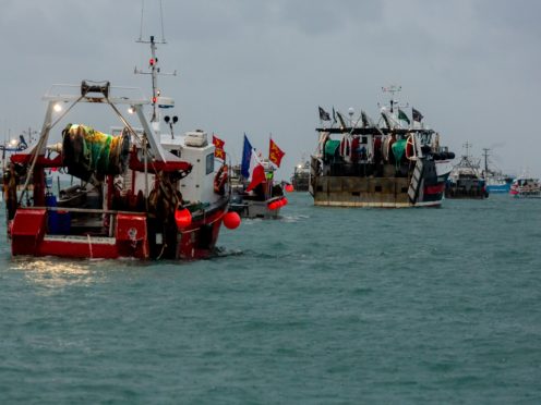 French fishing vessels staging a protest outside the harbour at St Helier (Gary Grimshaw/Bailiwick Express/PA)