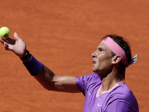 Rafael Nadal prepares to serve to Alexei Popyrin (Paul White/AP)
