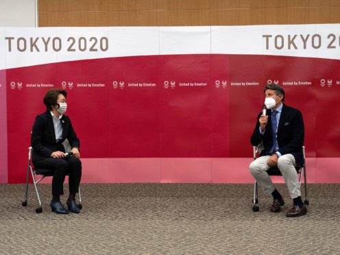 Seiko Hashimoto, president of the Tokyo 2020 Organizing Committee, left, listens during a meeting with Sebastian Coe, president of World Athletics, Friday, May 7, 2021 in Tokyo, Japan. (Carl Court/Pool Photo via AP)